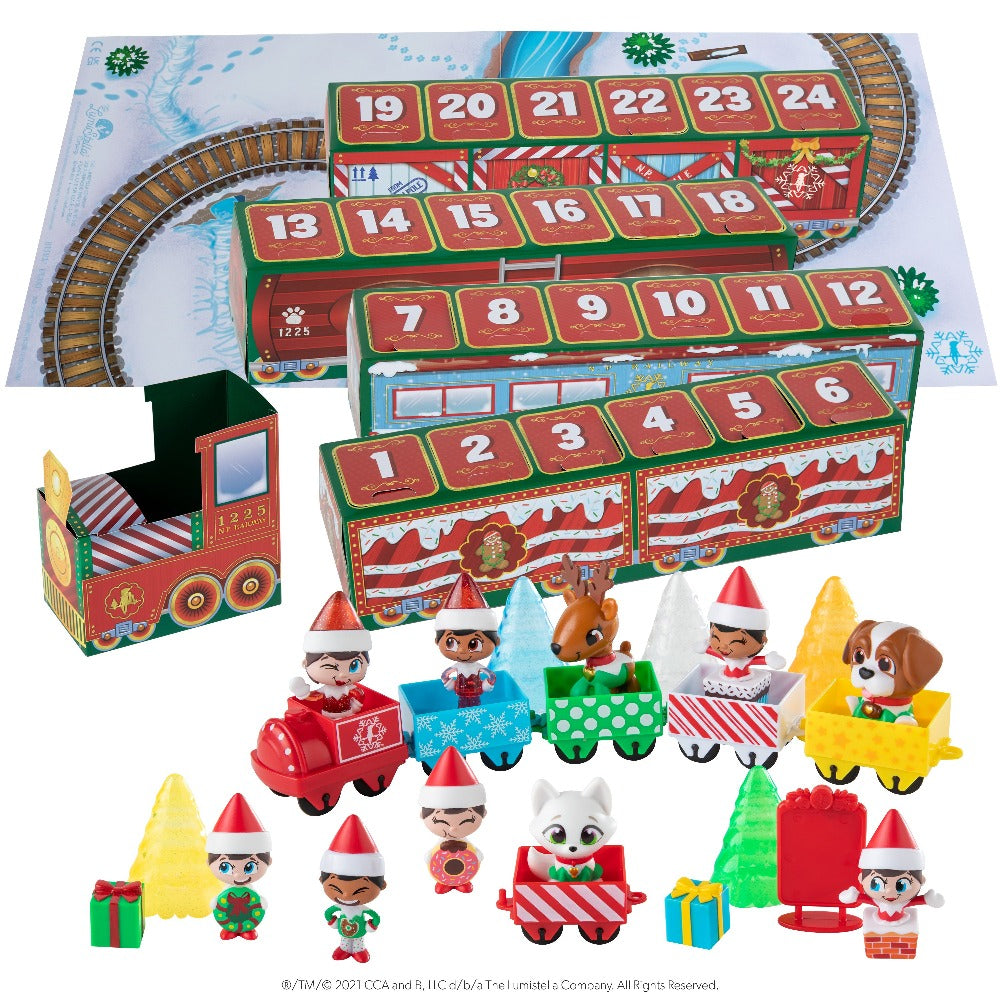 10 Scout Elf™ and Elf Pets® Minis 1 mini plastic train engine 5 mini plastic train cars Christmas Tree Farm sign 5 glittery Christmas trees 2 mini holiday gift boxes with contents out of box